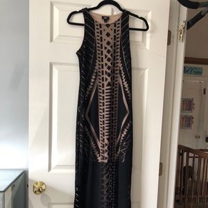 Women’s black and nude patterned dress size xs